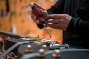 UpsizingGear_Problemen oplossen bij je gitaar rammelende frets, hoge actie en buzz